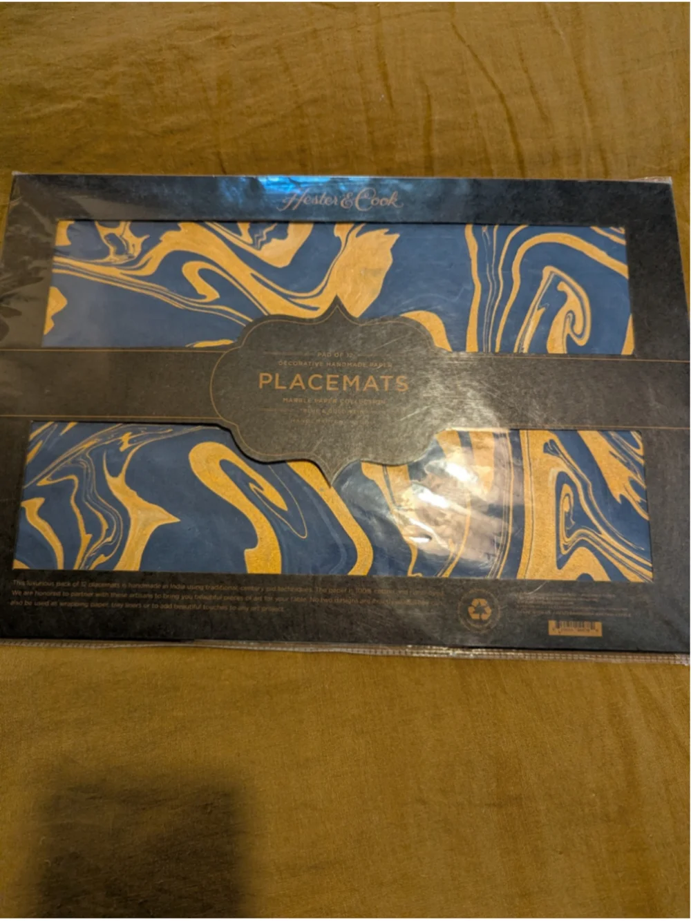 Hester and cook marbled collection paper placemats Blue and gold vein